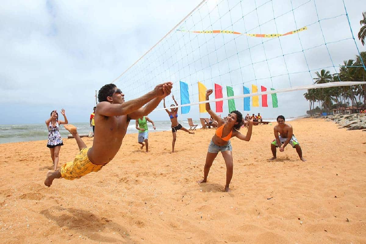 play volleyball on the beach beach volleyball